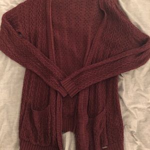 Long loose knit cardigan with buttons and pockets